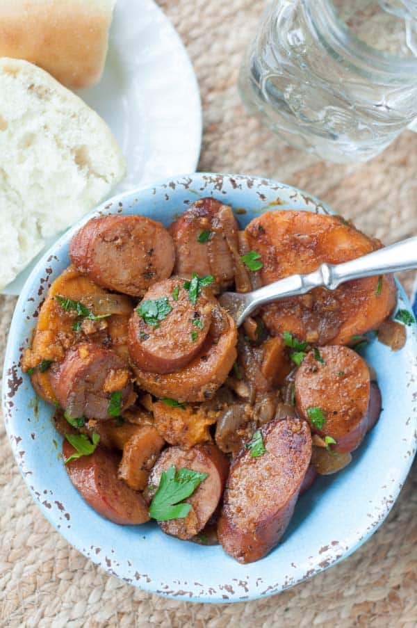 Sweet Potato, Caramelized Onion, Sausage Goulash is a healthy, delicious, comforting, gluten free dinner that is easily thrown together in one skillet. https://www.mamagourmand.com