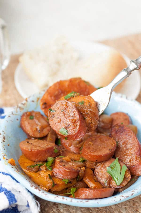 Sweet Potato, Caramelized Onion, Sausage Goulash is a healthy, delicious, comforting, gluten free dinner that is easily thrown together in one skillet. https://www.mamagourmand.com