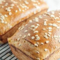 This Honey Oatmeal Bread recipe is an all-time favorite! It's light, airy, a touch sweet, and has a spongy crumb. It is an absolute perfect bread recipe! http://www.mamagourmand.com