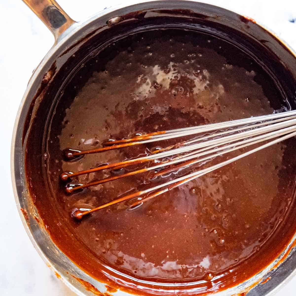 a whisk in the saucepan after the eggs have been added.