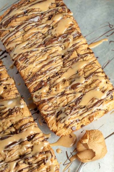 overhead shot of peanut butter bread with chocolate and peanut butter glazes drizzled over top