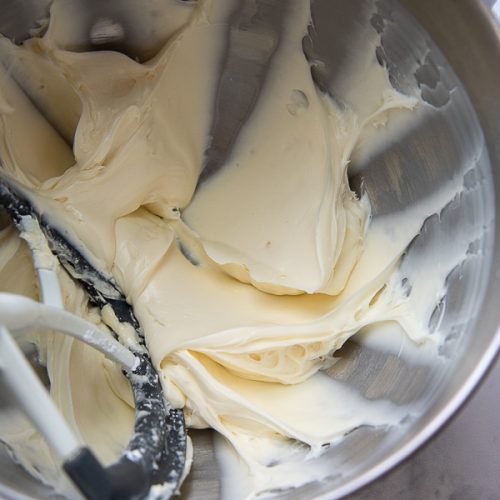 showing cream cheese powdered sugar mixture