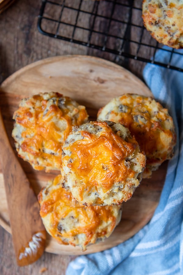 overhead view of muffins with cheese broiled on top