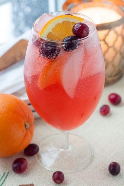 Sparkling Cranberry Orange Vodka Cocktail is a holiday cocktail drink with cranberry vodka, hint of orange, cranberry orange simple syrup, and a little fizz