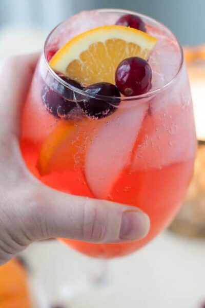Sparkling Cranberry Orange Vodka Cocktail is a holiday cocktail drink with cranberry vodka, hint of orange, cranberry orange simple syrup, and a little fizz