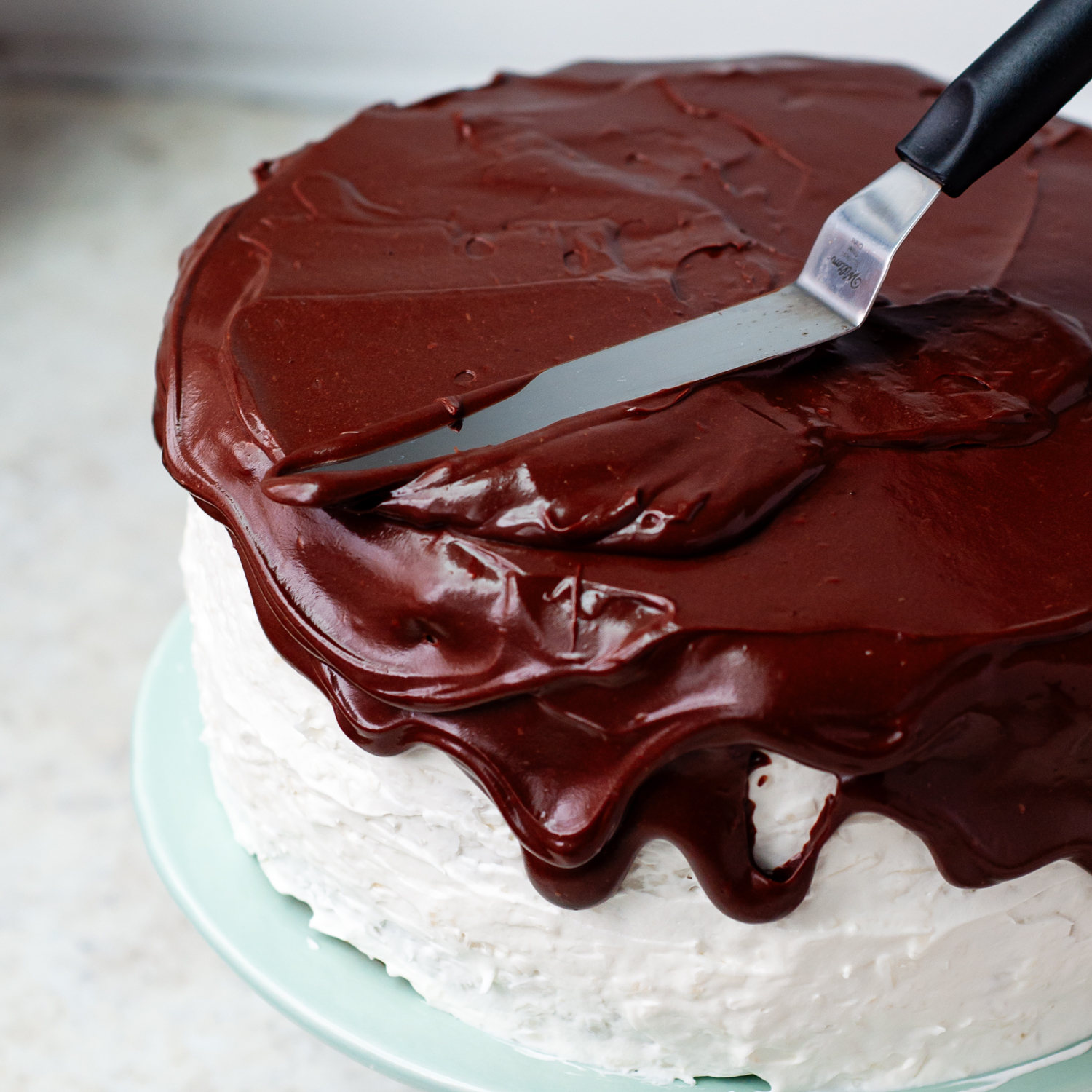 chocolate frosting spread over the top.