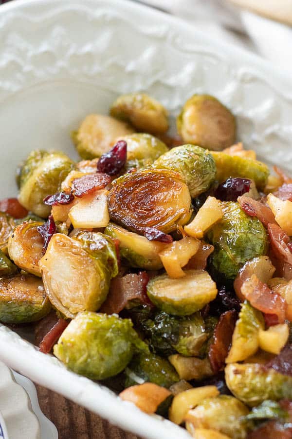 a close up of a bacon Brussels sprouts in a serving bowl