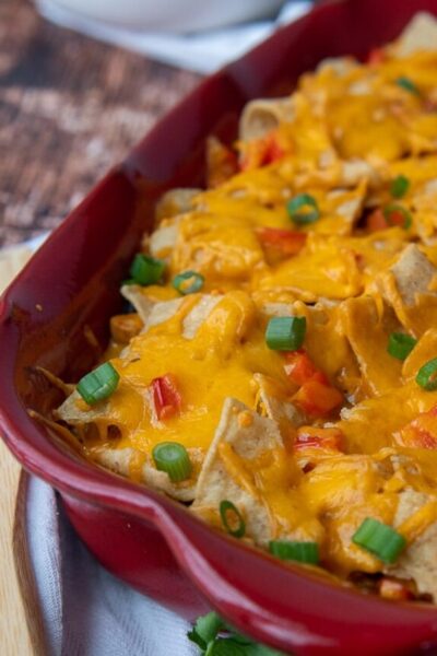 a close up of mexican chicken casserole with melted cheese on top