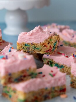 frosted funfetti bar stacked on top of each other