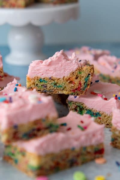 frosted funfetti bar stacked on top of each other