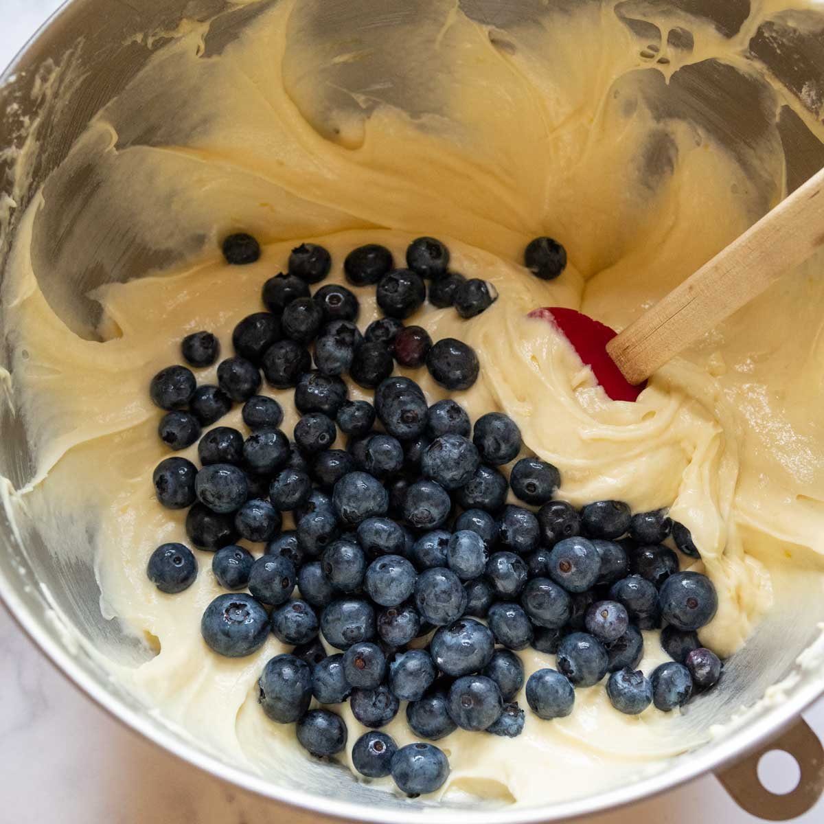 blueberries stirred in the mixture