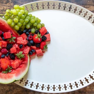how to make a dessert platter second step - filling watermelon with fruit