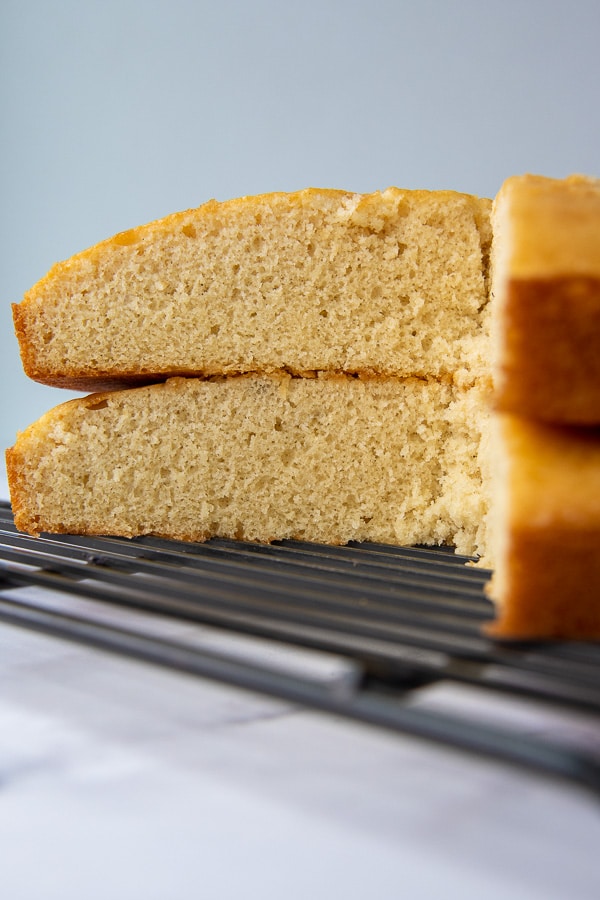 two layers of cake stacked on top each other, unfrosted