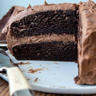 a chocolate layer cake sliced to show inside