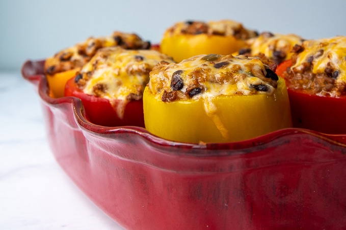 a casserole dish of stuffed peppers, mexican-style