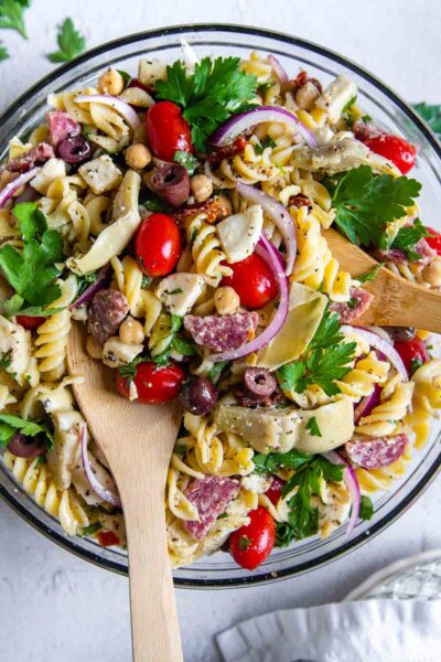 overhead shot of pasta salad in a glass bowl.