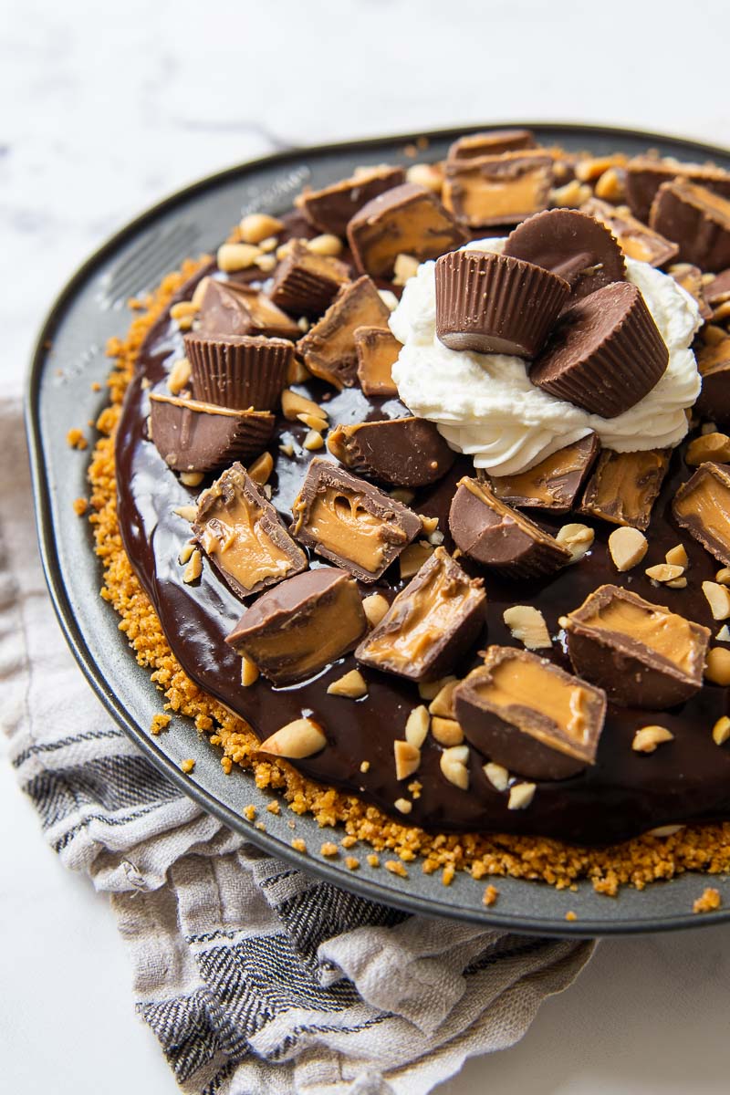 whole chocolate peanut butter pie with reeses peanut butter cups on top
