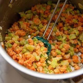 veggies in a saucepan coated with gluten free flour