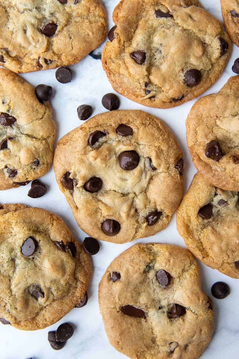 overhead shot of gluten free chocolate chip cookies on a white background laying flat
