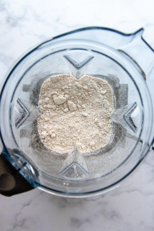 overhead shot of oat flour in a blender
