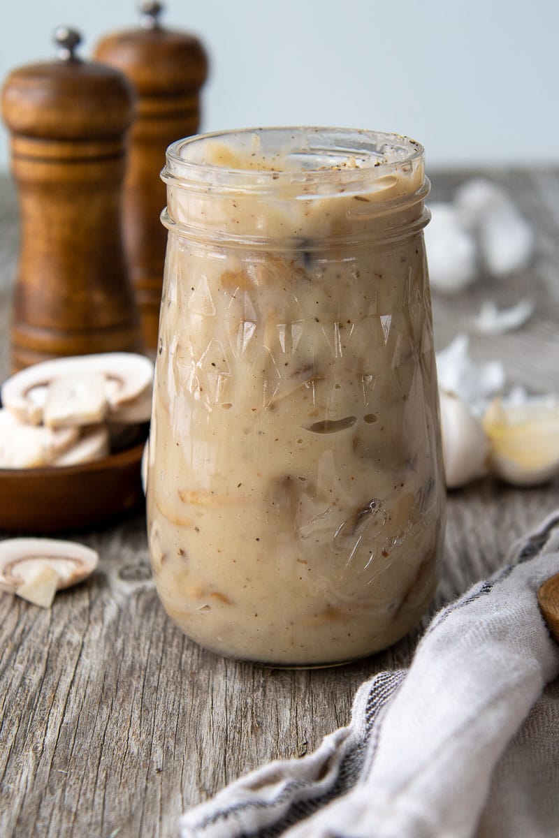 image showing condensed gluten free cream of mushroom soup in a glass jar