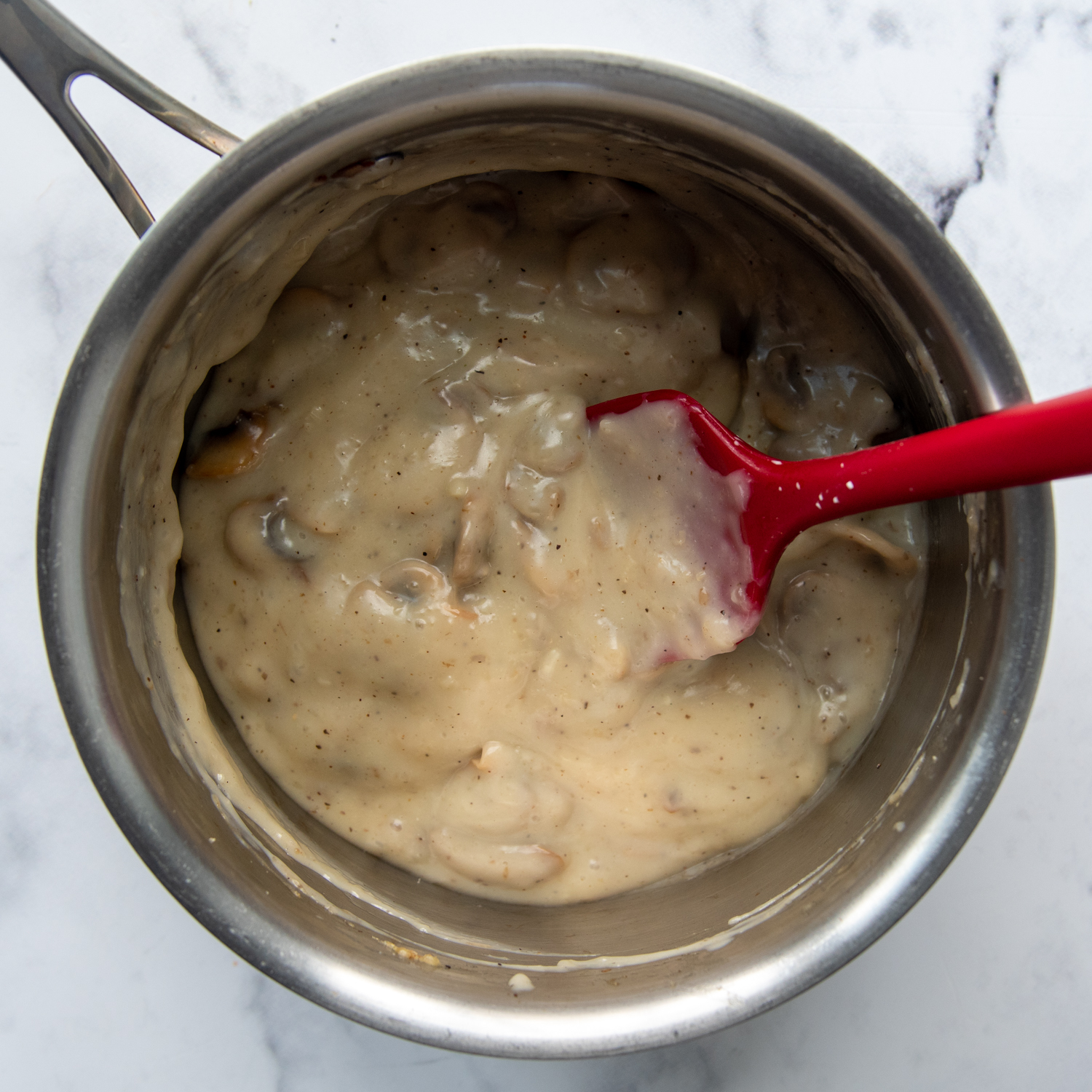 adding a little bit of milk to thin out the soup.