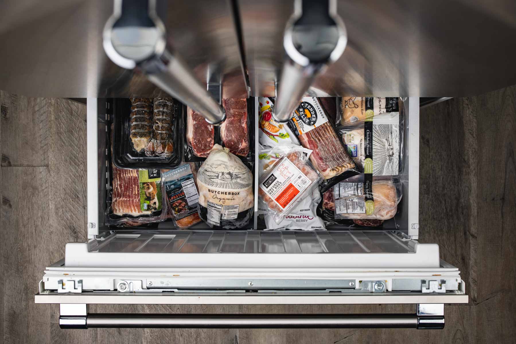 overhead shot of freezer with butcherbox meat inside