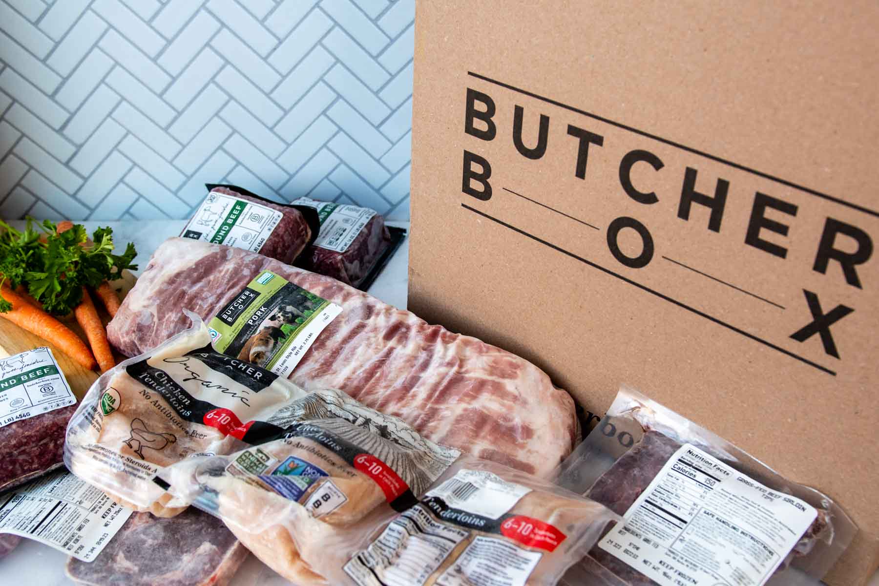 frozen meat laying next to cardboard box