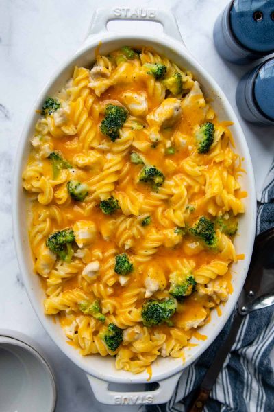 overhead shot of chicken broccoli pasta casserole with melted cheese on top