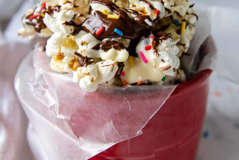close up of chocolate popcorn with sprinkles.