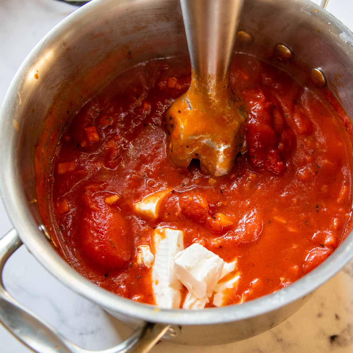 image showing gluten-free tomato soup being blended.