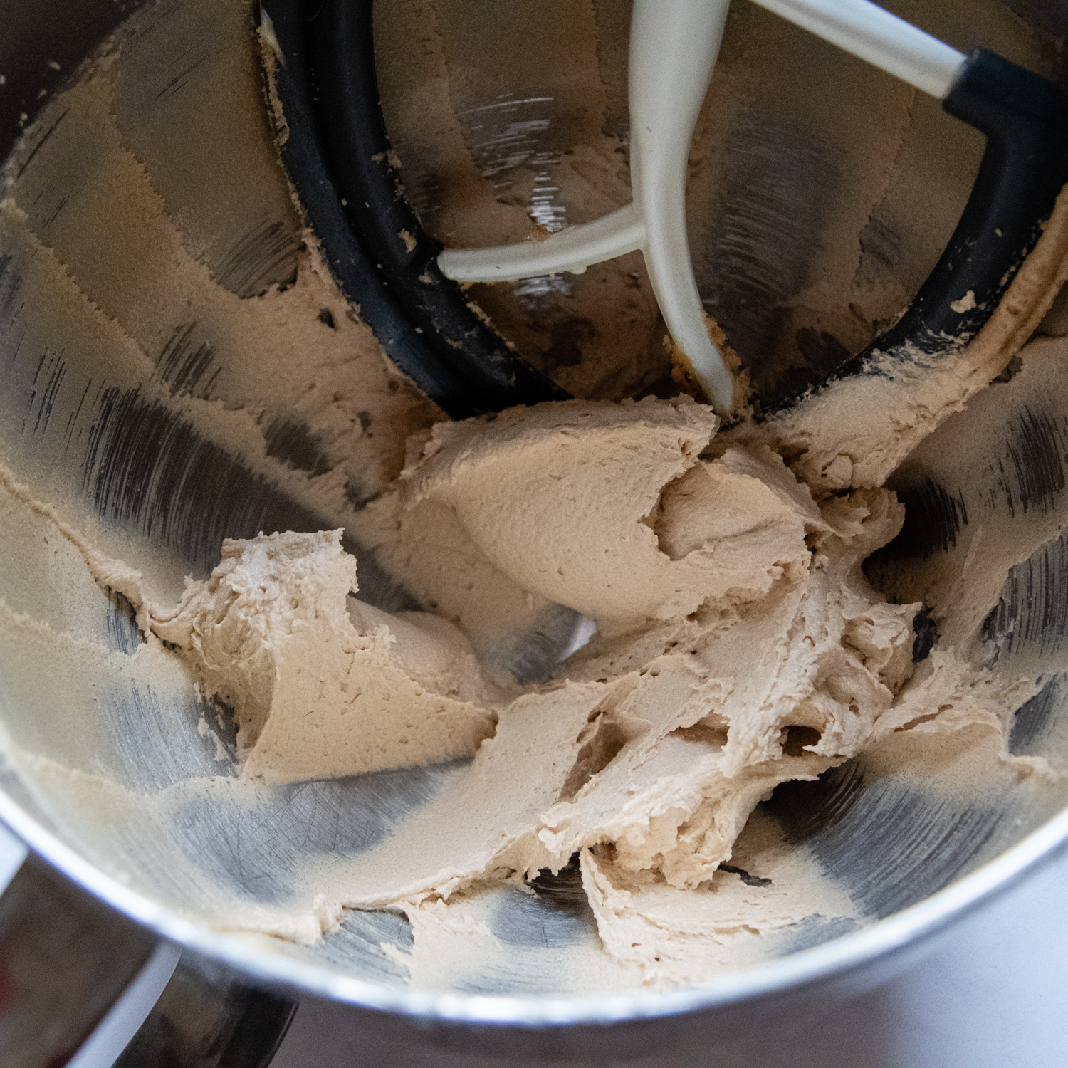 butter and sugars creamed together in a large mixing bowl.