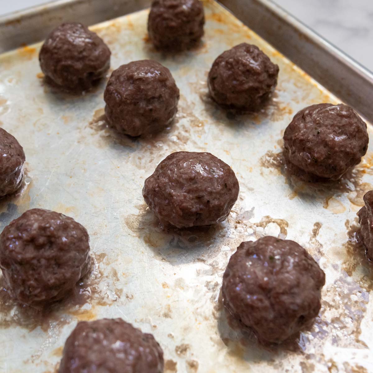 meatballs after browning in an oven.