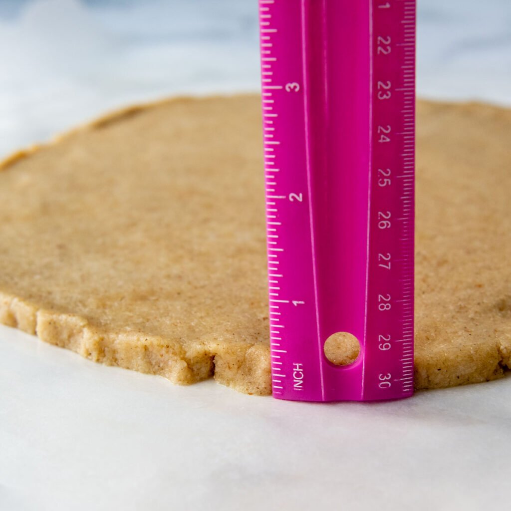 ruler showing thickness of the pizza crust.