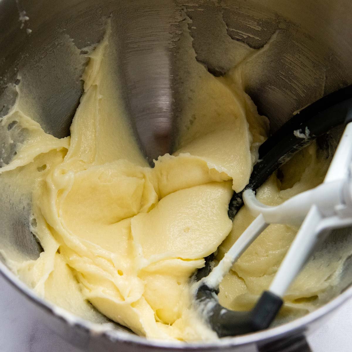the pound cake mixture after the butter, cream cheese and sugar has been mixed.
