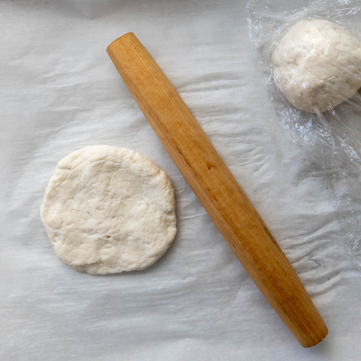 the dough ball flattened before rolling.