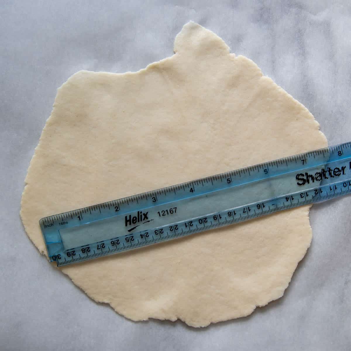 a rolled tortilla with a ruler on it.