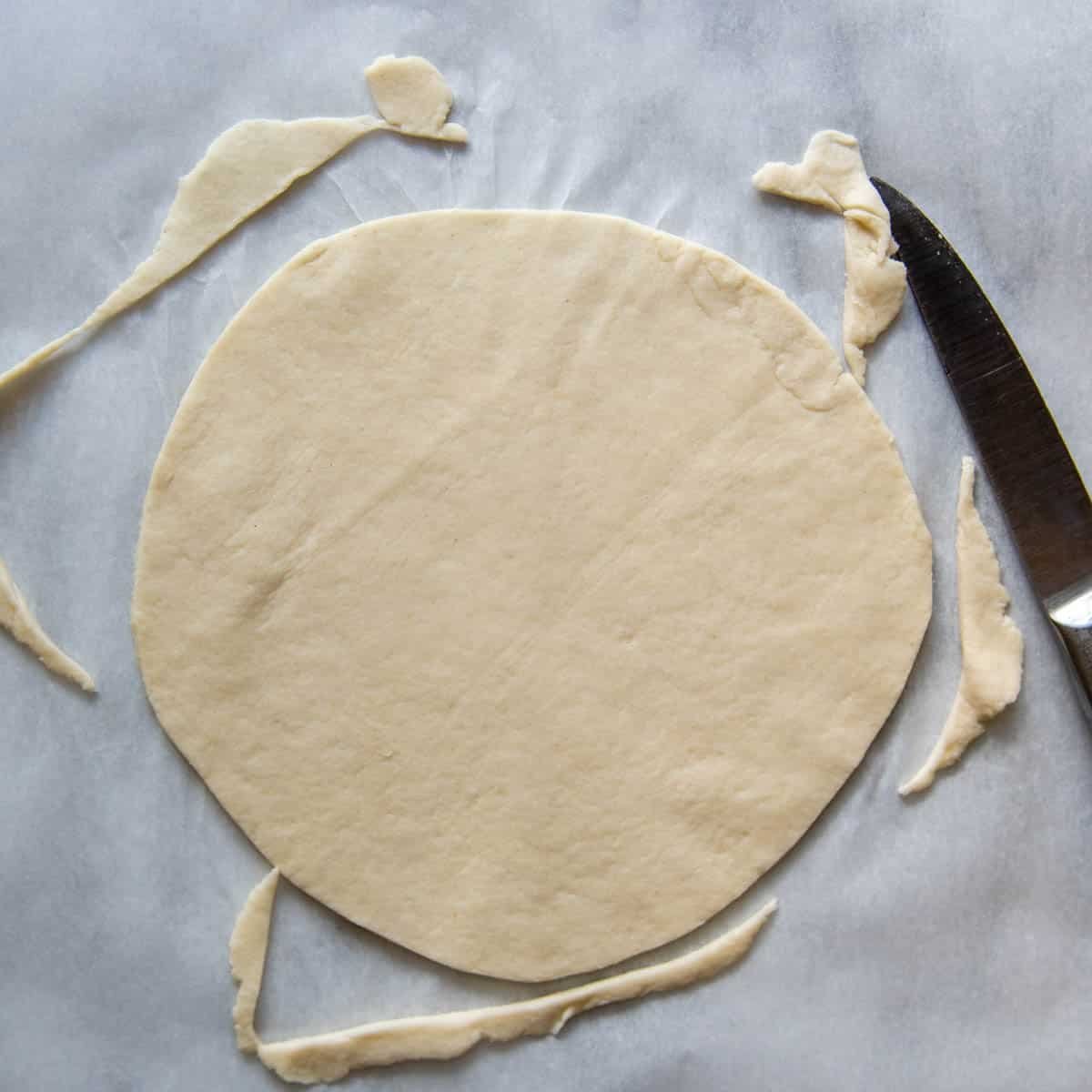the edges cut off to make a perfect circle.