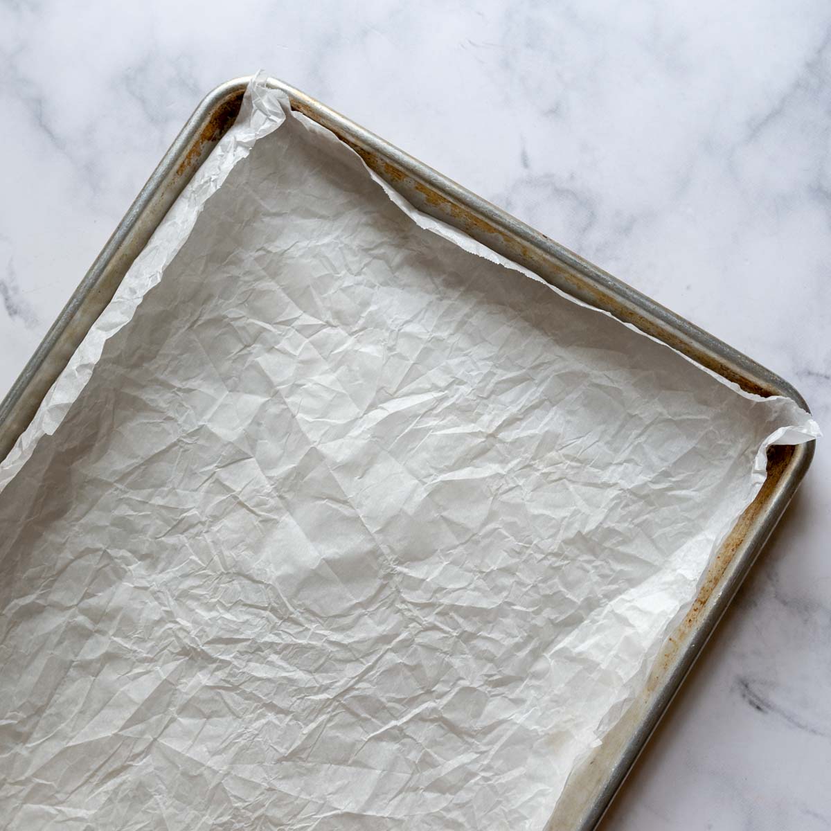 a baking sheet with parchment on it.