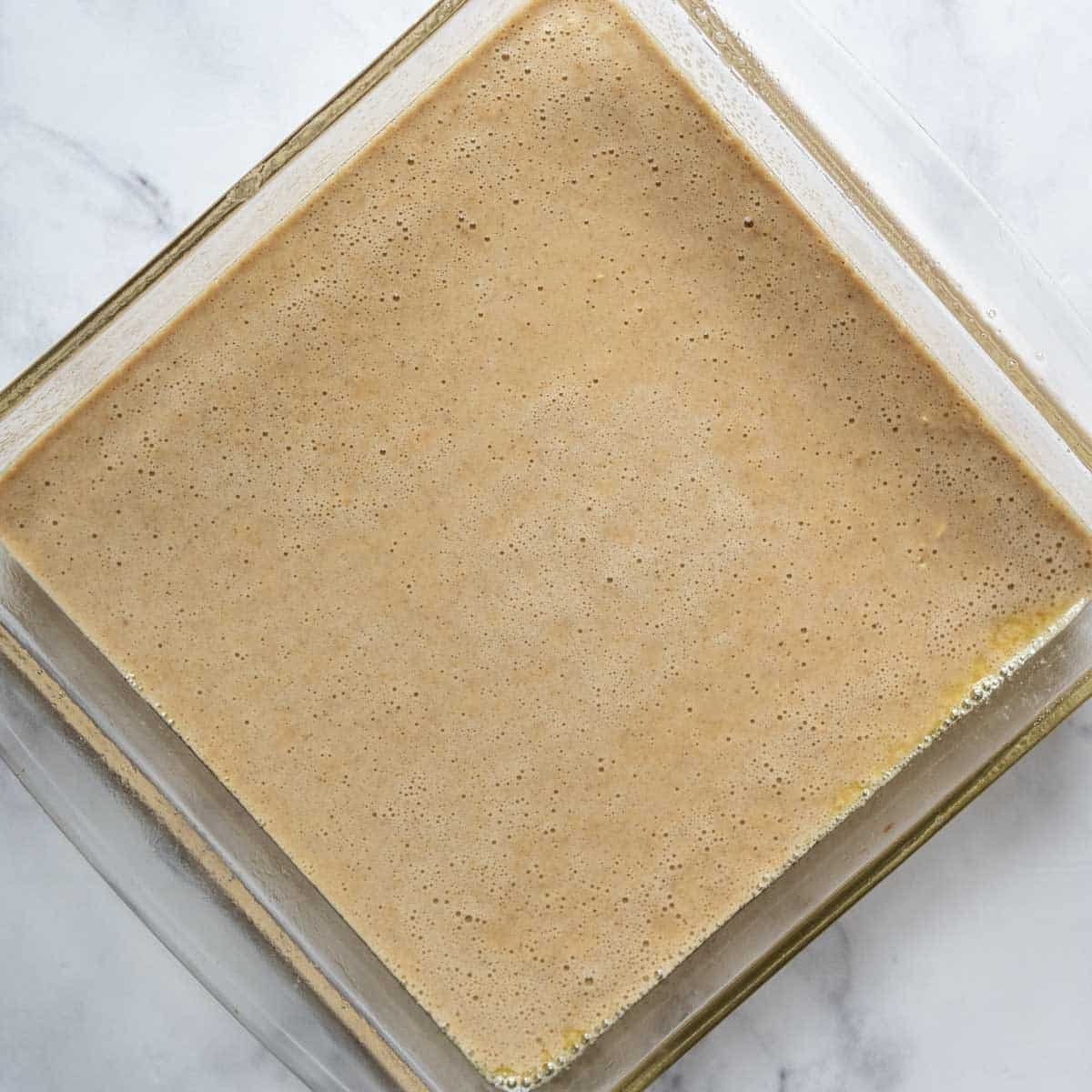 unbaked cake batter in the pan.