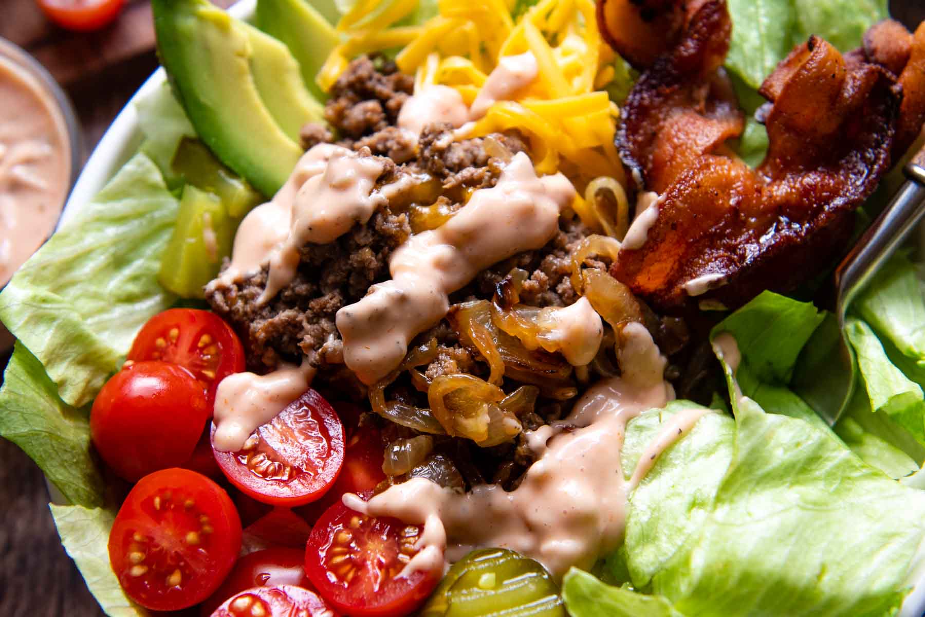 close up of ground beef mixture in a salad bowl.