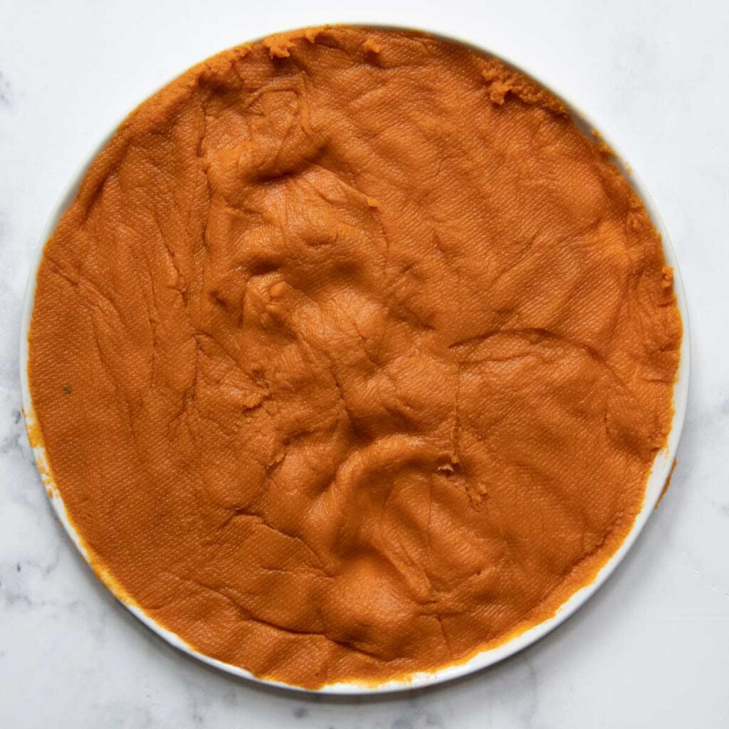 pumpkin spread out in a thin layer and moisture removed.