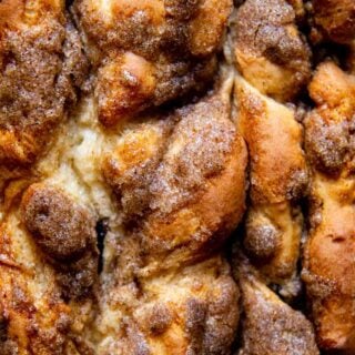 close up of the top of bread with cinnamon swirl.