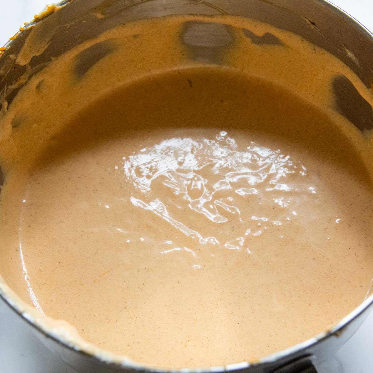 the cheesecake batter in a bowl after mixing.