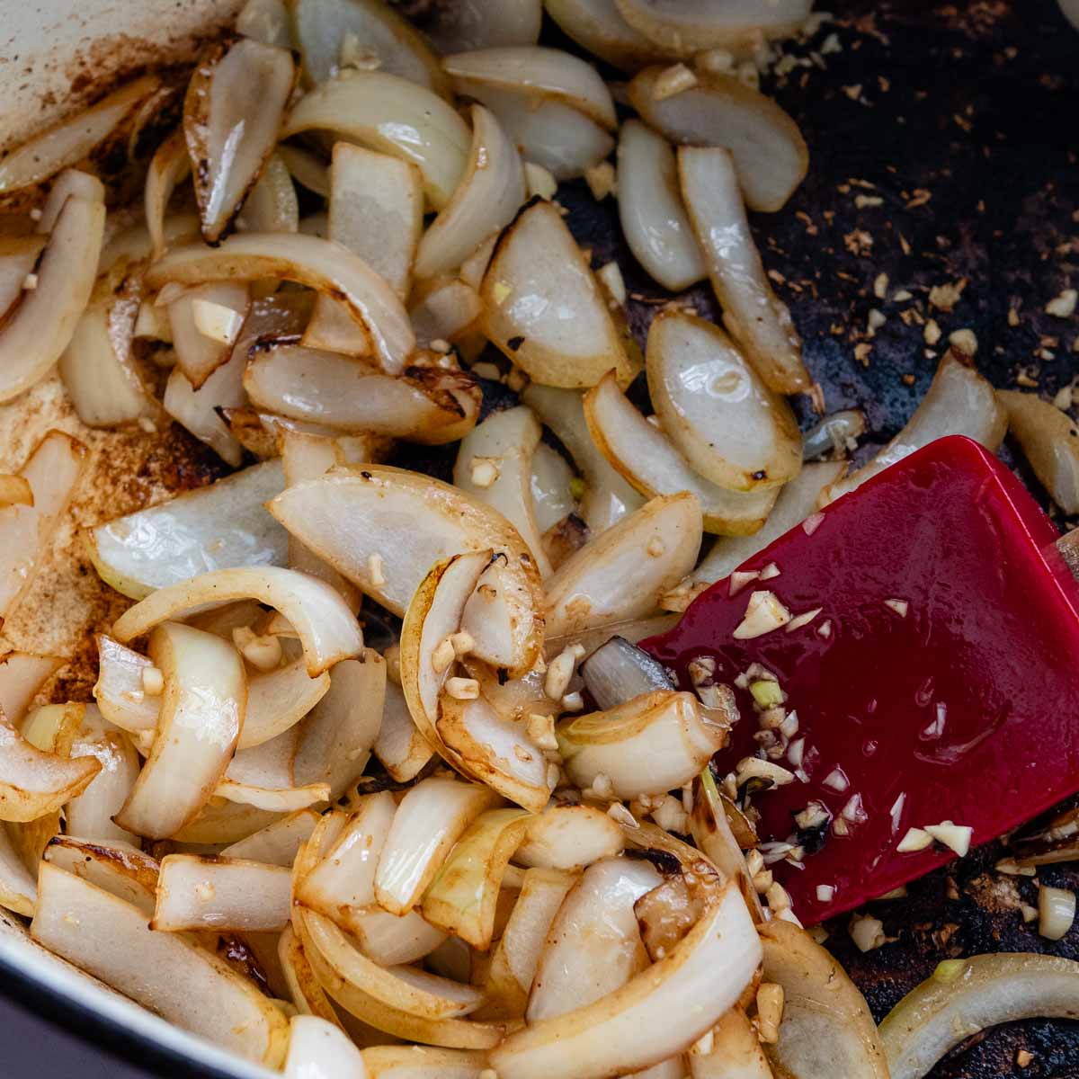 cooked onions in a pot.