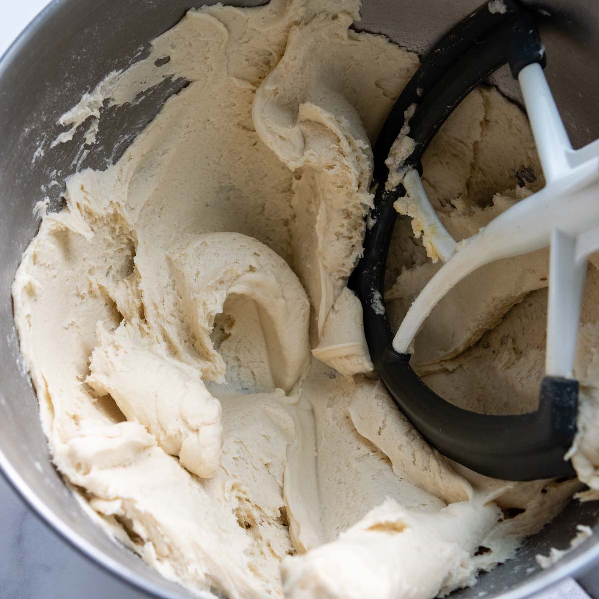 gluten free calzone dough in a mixing bowl.