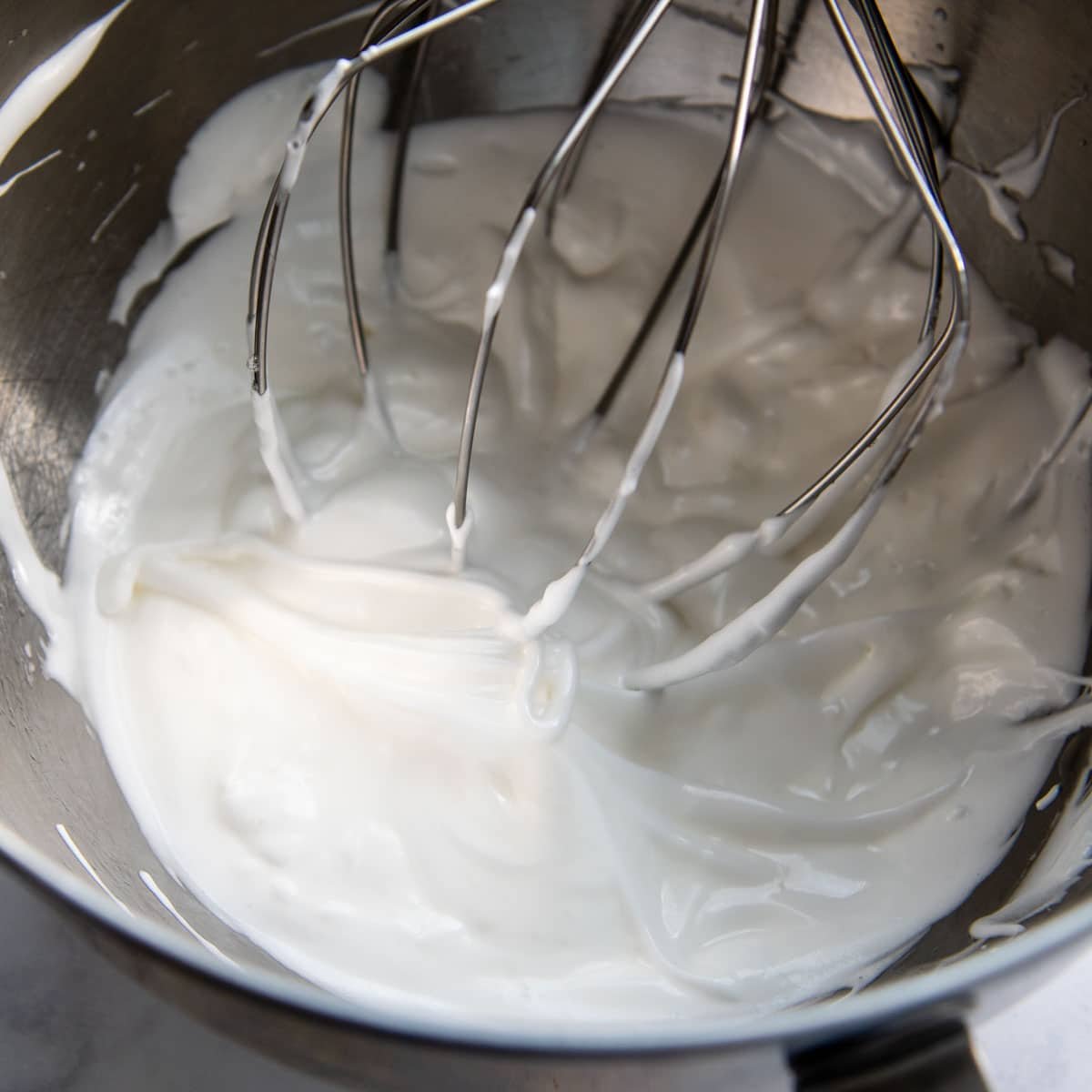 egg whites beaten in a large bowl.