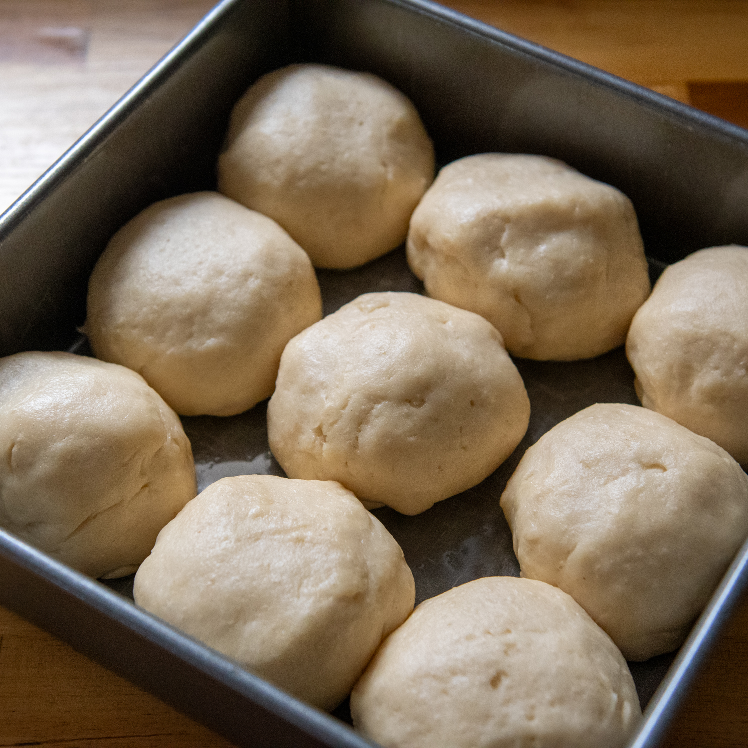 Dough balls having sat have increased in size.