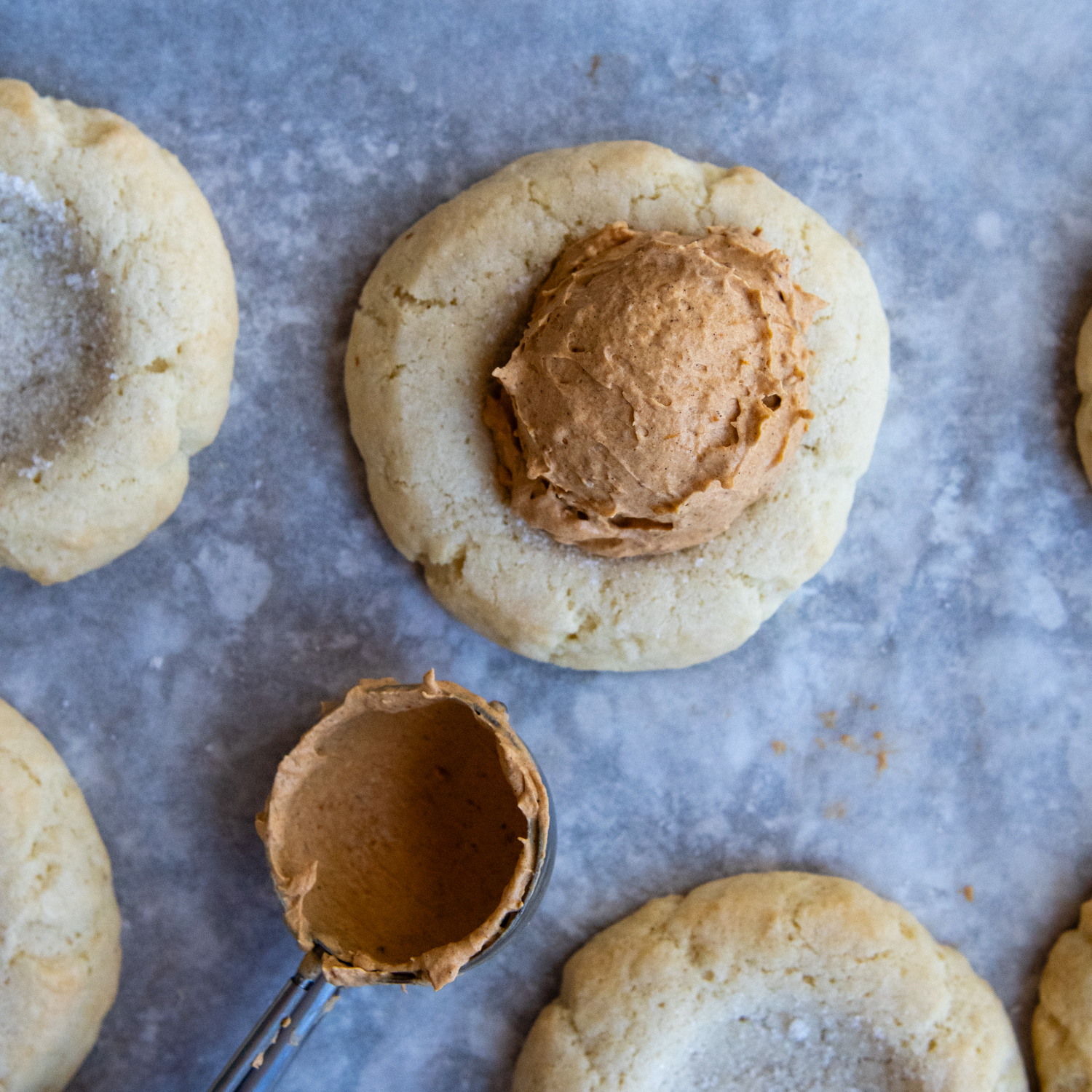 Topping being added to cookie.