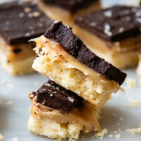 Stack of gluten free millionaire bars.